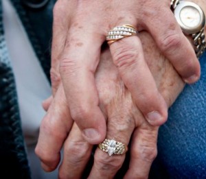 older-couple-holding-hands